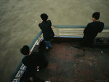 Men Stand Against the Railing of a Boat on the Yangtze River Lámina fotográfica