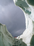 Hikers in an Ice Cave on Root Glacier Photographic Print
