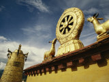 Prayer Wheel, Deer and Wheel of Dharma on the Roof of the Jokhang Photographic Print