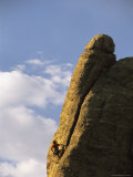 Man Climbing the South Tower Route on a Rock Formation in the Needles Photographie