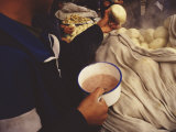 Kung Fu Students Breakfast on Steamed Breads and Rice Porridge Lámina fotográfica