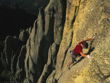 Man Climbing the South Tower Route on a Rock Formation in the Needles Photographie