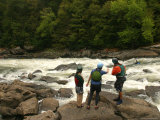 Kayakers Scout Rapids from the Waters Edge Photographic Print by Skip Brown