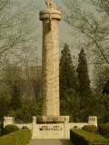 Carved Stone Lions on Pillars Near the Entrance to the Ming Tomb Site Photographic Print
