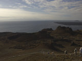 Tourists on a Path to a Scenic Overlook in the Galapagos Islands Photographic Print