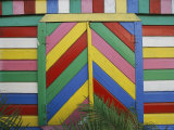A Brightly Colored Shuttered Window and Walls Photographie