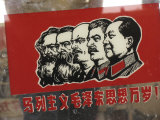 A Window Decal of Communist Leaders Photographic Print by Richard Nowitz