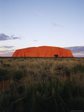View of Ayers Rock Under a Purplish Twilight Sky Photographic Print