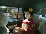 Kimono-Clad Geisha Sits in the Back of a Cab Photographic Print