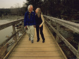 A Couple Enjoys a Walk on the Great Falls Canal Towpath Photographic Print by Raymond Gehman