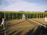 An Umpire Watches a Game on a Tennis Court Carved from a Cornfield Photographic Print