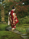 Kimono-Clad Geisha in a Park on a Bridge Above a Stream; She is a Maiko or Apprentice Geisha Photographic Print