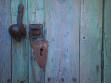 An Antique Lock on a Blue Door Photographic Print by Raul Touzon