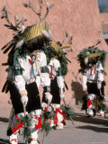 Native American Men Perform a Deer Dance in Costume Photographic Print by Ira Block