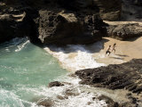 A Couple Run on Halona Beach Photographic Print by Charles Kogod