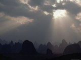Sunlight Illuminates Limestone Peaks in a Karst Region near Guilin, Guangxi Province, China Photographic Print