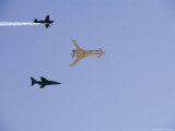 Jet Fighter and Other Airplanes Flying in Formation in a Blue Sky Photographic Print