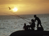 Silhouetted People Fish from the Shoreline near Montevideo, Montevideo, Uruguay Photographic Print by James L. Stanfield