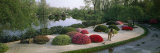 In a Japanese Garden, a Gardener Rakes the Gravel to Suggest Ripples Photographic Print by James P. Blair