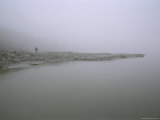 Solitary Figure on the Fog-Enshrouded Shore of the Okpilak River, Alaska Photographic Print