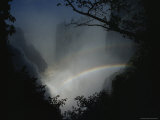 Rainbow Arcs Across Victoria Falls, Zimbabwe Photographic Print