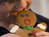 A Gingerbread Man Reacts to Being Eaten by a Young Male Photographic Print by Joel Sartore