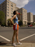 A Woman Drinks During a Workout Photographic Print by Taylor S. Kennedy