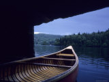 A Canoe Sticks Out of a Boathouse on an Early Morning Day, Quebec, Canada Photographic Print