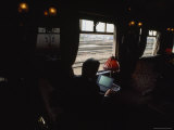 Man Works at His Laptop Computer Aboard the Orient Express Photographic Print by Jodi Cobb