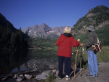 A Baby Boomer Couple Admire the View of the Maroon Bells, Aspen, Colorado Photographic Print by Taylor S. Kennedy