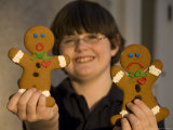 Gingerbread Cookies React to the Prospect of Being Eaten by a Boy Photographic Print by Joel Sartore