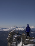 A Man Admires the View Over the Canadian Rockies Photographic Print by Taylor S. Kennedy