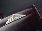 Black Leather Briefcase with American Dollar Bills in the Pocket Lámina fotográfica