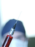 Hypodermic Needle Containing Red Blood Photographic Print