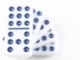 Pile of Black and White Dominoes Against White Background Lámina fotográfica