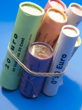 Paper Rolls of Euro Coins Bundled Together Photographic Print