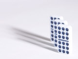 Line of Three Black and White Dominoes Against White Background Lámina fotográfica
