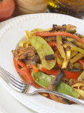 Fork Beside Bowl of Pasta with Grilled Vegetable Sauce Lámina fotográfica