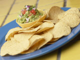 Tasty Nacho Chips Beside Bowl of Fresh Guacamole Fotografie-Druck