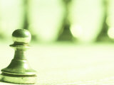 Silver Pawn on Newspaper Stock Market Report with Line of Chess Pieces in Green Light Lámina fotográfica Silver Pawn on Newspaper Stock Market Report with Line of Chess Pieces in Green Light Lámina fotográfica