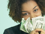Woman Holding Money Photographic Print