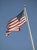 Us Flag Against Sky Lámina fotográfica