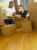 Couple Packing Dishes Photographie