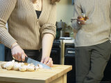 Couple Cooking and Drinking Wine Together Photographie