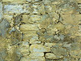 An Old Stone Wall with Crumbling Plaster Photographic Print