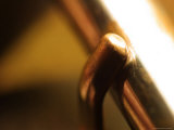 Close-up of a Worn Shiny Metal Belt Buckle Photographic Print