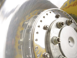 Close-up of a Metal Hub-Cap with Bolts and Rivets Photographic Print