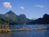Traditional Outrigger Canoes with Sailboats Photographic Print by Barry Winiker