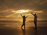 Couple in Sunset Photographic Print by Kevin Radford