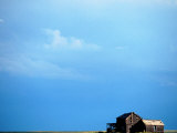 Clouds Over Abandoned Farmhouse Lámina fotográfica por Megan Meagher